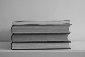 Stack of Books on White Table
